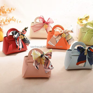 Mini bolso hecho a mano para mujer, nuevo bolso de cuero PU para boda, caja de dulces, diseño de lazo, cinta Kraft, bolso de fiesta, bolsas de papel de regalo - Product Image 1