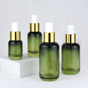 Flacon compte-gouttes à bouton-poussoir dégradé de luxe à baril rond fond épais 30ml huile essentielle 4 oz flacon compte-gouttes en verre vert 100ml - Product Image 5