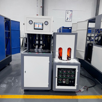 Nouvelle conception personnalisée, machine à souffler les bouteilles automatique à alimentation manuelle haute vitesse, 2 cavités, prix compétitif
