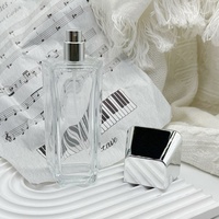 Emballage de bouteilles de parfum en verre à capuchon irrégulier transparent de forme unique de 100ml