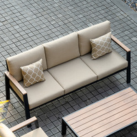 Ensemble de canapés de jardin modernes et minimalistes en gros pour hôtels, mobilier d'extérieur, table basse en aluminium et poly-bois pour patio