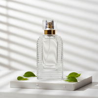 Bouteille de parfum transparente en verre OEM, nouveau design à la mode ml, avec couvercle