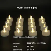 La decorazione gialla calda di cerimonia nuziale ha condotto le candele senza fiamma della luce del tè di 24 pezzi con le batterie