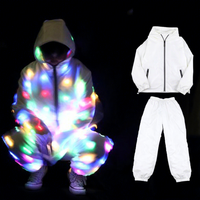 Bundy Cool New LED Glitter Bar Ensemble de vêtements coloré et émettant de la lumière pour les fêtes avec lumières et casquettes incluses