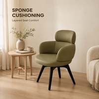 Fauteuil lounge Vivian en cuir PU avec structure en contreplaqué courbé, coussin en éponge et base pivotante pour salon