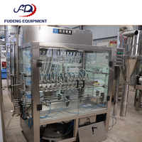 Machine de remplissage linéaire entièrement automatique d'occasion en acier inoxydable pour bouteilles, idéale pour l'huile comestible et les jus – Équipement de mise en bouteille quotidien