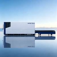 Machine de découpe laser entièrement fermée automatique Han's Laser avec table d'échange automatique pour la découpe laser de tôles et de fibres de carbone