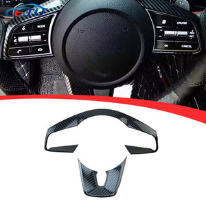 2 Piezas de Adhesivos Decorativos para el Marco del Volante con Aspecto de Fibra de Carbono para <span class=keywords><strong>Kia</strong></span> <span class=keywords><strong>Sportage</strong></span> R <span class=keywords><strong>NQ5</strong></span> - Product Image 1