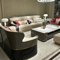 Ensemble de canapés en cuir véritable de style italien, luxe léger, en forme de U, avec design à dossier haut démontable et personnalisable pour l'ameublement de la maison