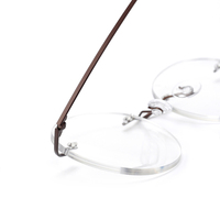 Lunettes rondes en titane sans monture optiques drôles transparentes