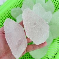 Vente en gros Quartz naturel brut de Nirvana Bouddha Guérison Cristal brut Forme de tour Pierre Top Cristal pour la décoration de cadeaux
