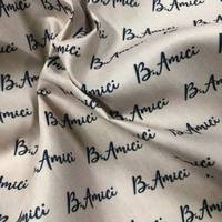 100% Polyester Logo Imprimé Peau De Pêche Microfibre Tissu Tissé Motif Brossé Caractéristique Résistant Aux Rides Filles Vestes Bagages