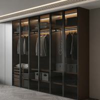 Armoire de luxe gris anthracite avec portes vitrées et éclairage LED, système de rangement encastré moderne, solution de rangement personnalisée pour chambre à coucher
