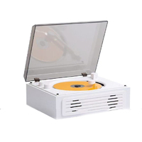 Système audio stéréo vintage tout-en-un avec lecteur de CD, cassette, tourne-disque, radio AM/FM, alimenté par piles, avec haut-parleurs