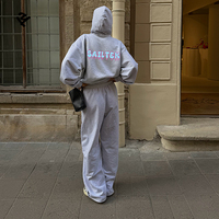 Ensemble de survêtement décontracté 3 pièces pour femme 2026 : sweat à capuche zippé, débardeur et pantalon de survêtement – Vente en gros