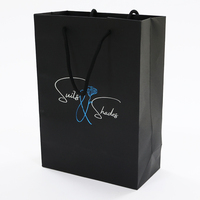 Sacs de shopping en papier d'art pour vêtements, emballages cadeaux en carton Euro Tote de luxe avec logo personnalisé imprimé