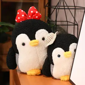 Giocattolo della bambola del cuscino del cuscino del giocattolo del bambino della peluche del pinguino del cappello di Bowknot farcito all'ingrosso personalizzato