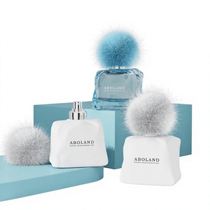 Flacon de parfum en verre ABOLAND, forme rectangulaire, avec pompon en fourrure, pulvérisateur, sceau, impression sérigraphique, couleurs blanc et bleu - Product Image 1