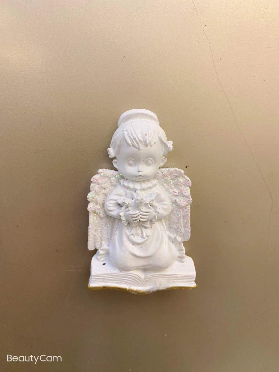 Kneel before the angel
