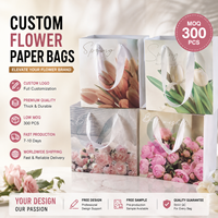 Sac cadeau en papier fleuri de luxe personnalisé avec poignée en ruban pour l'emballage de bouquets de fleuristes