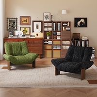 Fauteuil d'appoint contemporain surdimensionné en tissu avec pieds en bois, confortable pour la lecture et la détente, idéal pour les hôtels, cafés, halls d'entrée et salons.