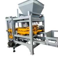 Machine à Briques Hydraulique QT4-15 pour la Production de Blocs de Maçonnerie en Béton, de Pavés et de Matériaux de Construction