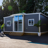 Maison conteneur en acier extensible moderne de 40 pieds avec toit en chevrons - Appartement préfabriqué avec cuisine, chambre et salle de bain pour grand-mère