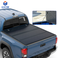 Couverture de benne pliante en quatre parties en alliage d'aluminium rigide à profil bas pour Toyota Tacoma 2024-2025 avec benne de 5 pieds – Accessoires pour pick-up