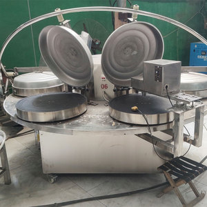 Machine <span class=keywords><strong>à</strong></span> Injera Éthiopienne Traditionnelle Automatique <span class=keywords><strong>à</strong></span> Chauffage Électrique pour la Cuisson Continue <span class=keywords><strong>de</strong></span> Pain Plat au Teff – En Vente - Product Image 1