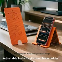 Nouveau support pliable en silicone pour téléphone portable et tablette, support de bureau intégré, à poser sur le bureau, support de téléphone portable réglable et portable