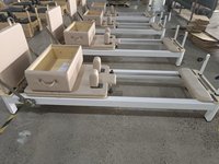 Machine d'entraînement de qualité supérieure pour studio de yoga et de Pilates, fabriquée par le fabricant OEM, de qualité commerciale, couleur beige tendance, Reformer de Pilates en aluminium