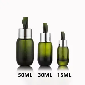 एसेंस स्किनकेयर के लिए 15 मिली 30 मिली 50 मिली हरी हॉट सेल लक्ज़री स्प्रे ड्रॉपर ग्लास एसेंशियल ऑयल ग्लास बोतल