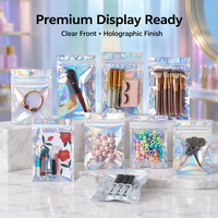Sac à fermeture éclair transparent holographique arc-en-ciel 20*30cm, face avant transparente, face arrière transparente, avec trous circulaires pour l'emballage de cosmétiques