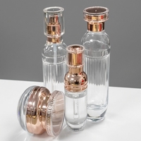 Ensemble d'emballages de luxe en verre pour soins de la peau : flacon pompe pour lotion, compte-gouttes pour sérum, pot à crème, conteneur cosmétique vide pour présentation