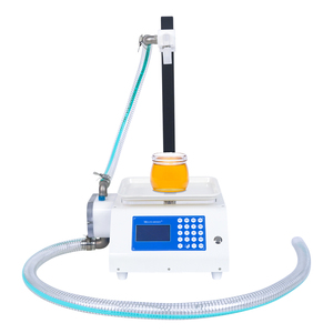 Machine de remplissage de bouteilles automatique à économie d'énergie de précision de 5g 250W aucun compresseur d'air nécessaire pour le ketchup et l'huile - Product Image 1