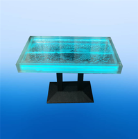 Luxuriöser Acryl-LED-Licht-Couchtisch mit Tischdekoration