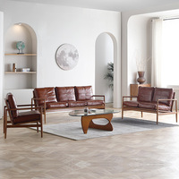 Canapé en cuir et bois massif de style nordique, minimaliste italien, pour salon et chambre, avec revêtement en cuir de vachette pleine fleur et rembourrage en duvet