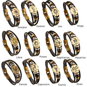 Pulsera de Cuero Trenzada Multicapa con Dijes de los 12 Signos del Zodíaco, Hecha a Mano, Estilo Vintage, de Moda, ¡Gran Venta! - Product Image 1