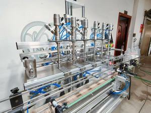 Macchina per il riempimento di liquidi a sei teste indispensabile: veloce, regolabile. Risolvere i problemi di riempimento nel cibo, nelle bevande. Aggiornamento oggi - Product Image 2