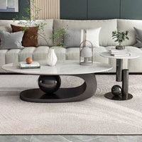 Table basse ronde pliable moderne avec plateau en marbre blanc, base en métal poli, accent sphérique réglable pour salon