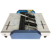 Machine à faire des livrets multifonctionnelle 3 en 1, conçue pour le traitement polyvalent du papier, y compris l'agrafage, le pliage et les tâches d'agrafage latéral