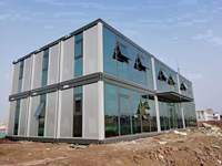 Maison conteneur détachable, peut être utilisée comme dortoir pour les travailleurs, personnalisable à deux ou trois étages, options de mur-rideau en verre