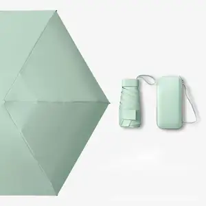 Goede Kwaliteit Lichtgewicht Opvouwbare Kleurrijke Capsule Uv Mini Custom Reclame Zon Kleine Paraplu Met Logo
