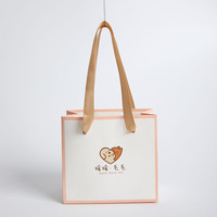 Sacs en Papier Noirs de Luxe avec Poignées en Ruban pour Boutiques, Emballage Commercial Personnalisable avec Votre Logo