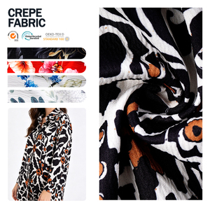 Tela de crepé de poliéster de alta calidad, textil elástico con diseño único para la confección de prendas. - Product Image 1
