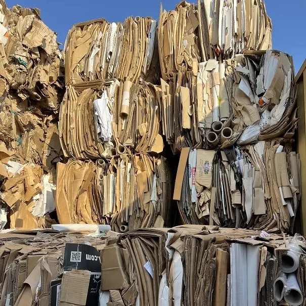 PAPER OCC (OLD CORRUGATED CARDBOARD - CARTON) BALES SCRAP / WASTE FOR RECYCLING.