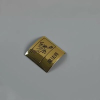 Étiquette de parfum de luxe en gros, en alliage d'aluminium 3D, personnalisée, avec logo en relief imprimé en sérigraphie pour parfum haut de gamme