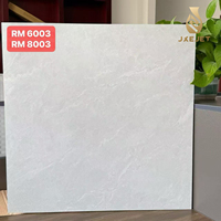 Carreaux de sol en porcelaine antidérapants à motif marbre gris 600x600 mm, adaptés aux villas, hôtels, centres commerciaux et autres lieux.