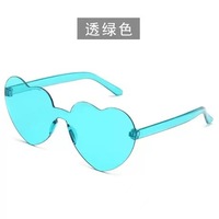 Lunettes de soleil coeur de pêche amour lunettes de soleil gelée couleur sans cadre en forme de coeur lunettes une pièce lunettes de couleur éblouissante