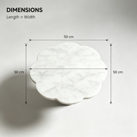 Table basse de luxe bicolore en marbre, plateau blanc festonné, base cylindrique veinée noire, design minimaliste moderne, mobile